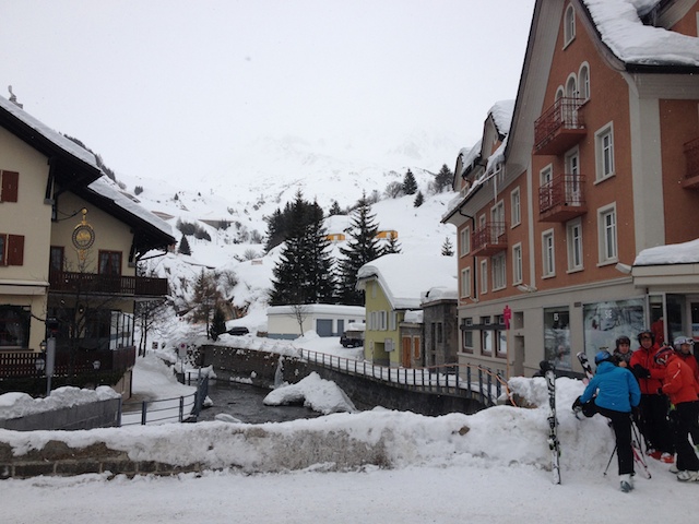The town of Andermatt, looking up at the mountain.