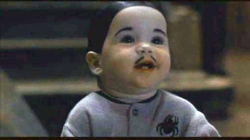An indestructible baby with a mustache. How peculiar!
