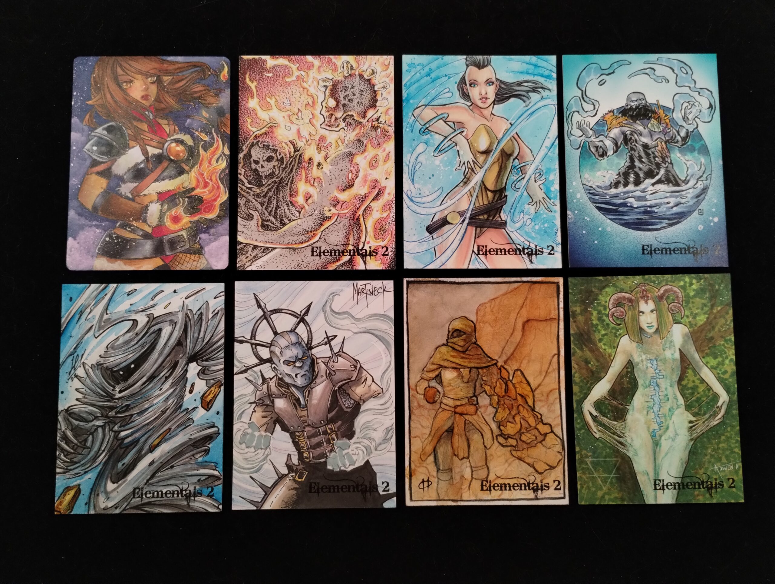 Eiight sketch cards arrayed in two rows