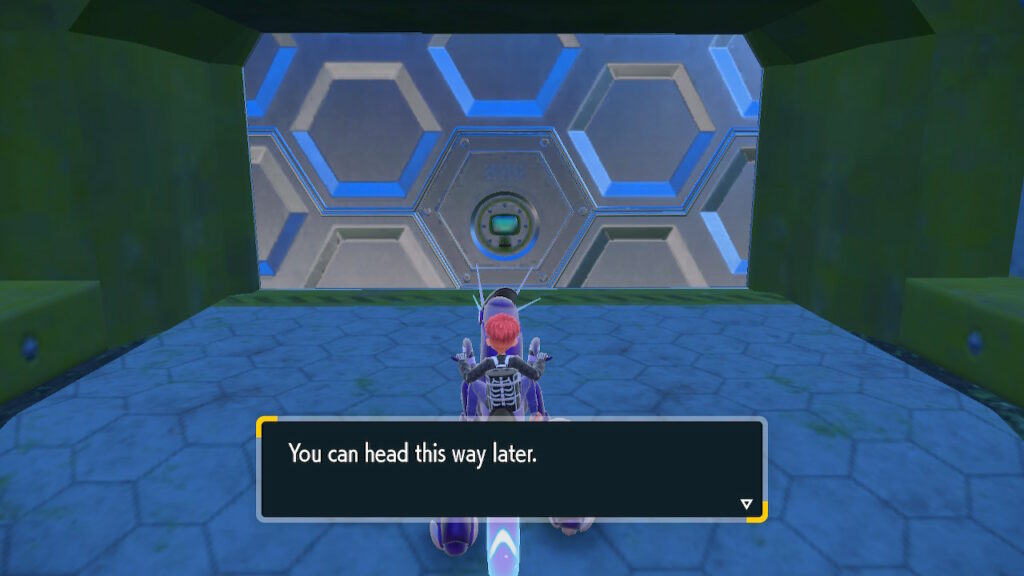 The player-character stands in front of a large, inviting, impressive-looking, technologically-advanced gate…but a message on the bottom of the screen reads ‘You can head this way later.’