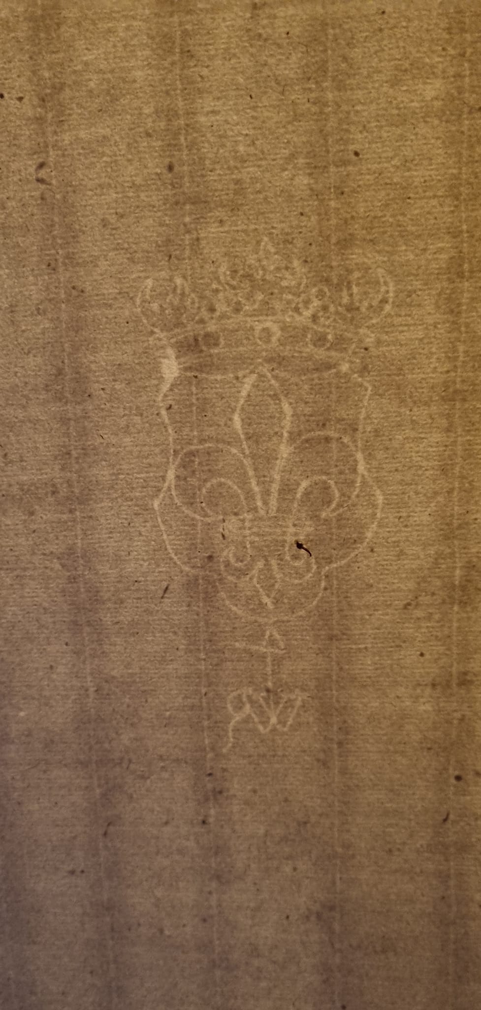 17th-century Wendelin Reihel paper, backlit to show watermark.