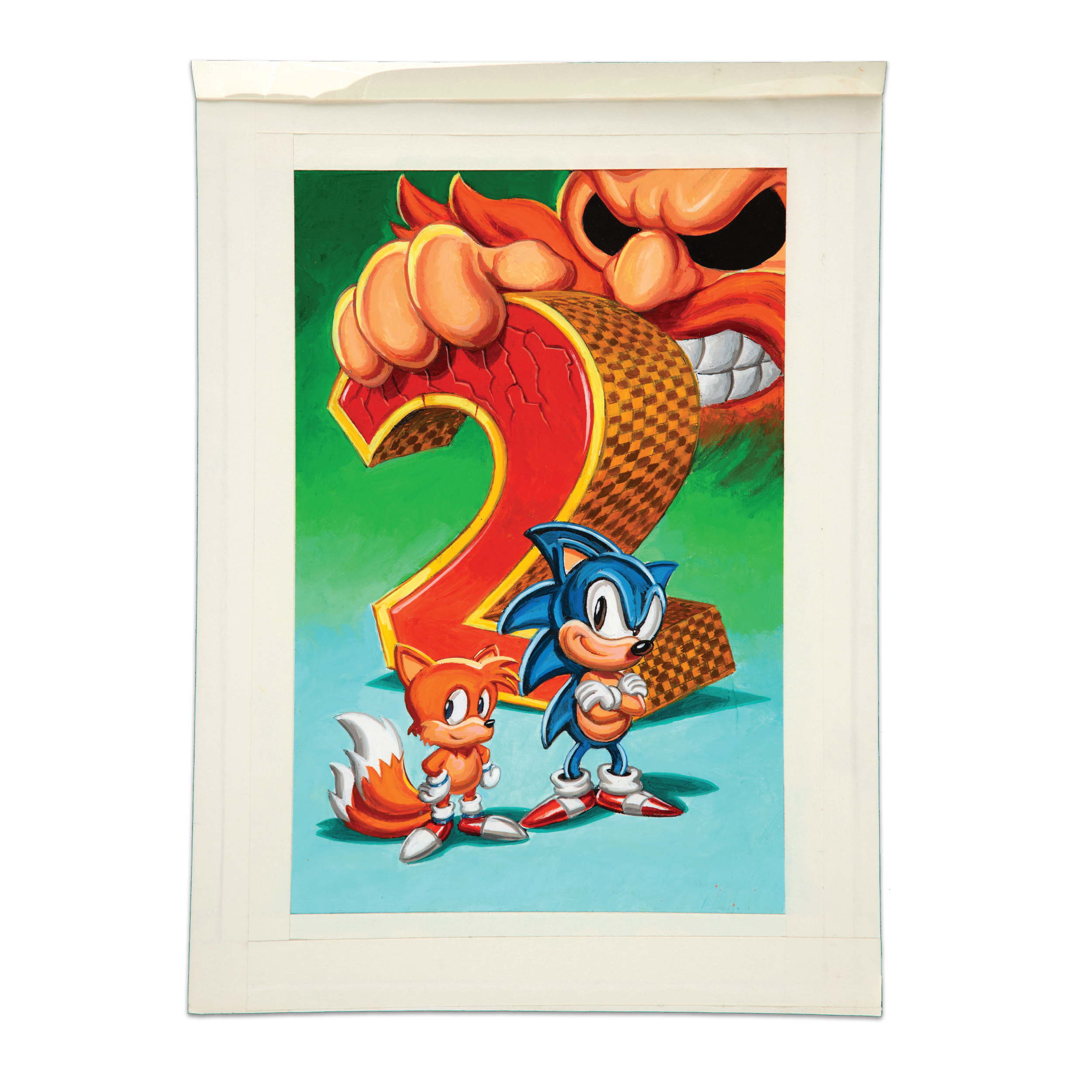 The cover art for Sonic: The Hedgehog 2. It features the characters of Sonic and Tails, standing in front of large 2 with Dr. Robotnic looking on menacingly.